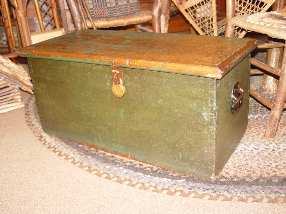 Great painted
              primitive trunk with original green paint. Dovetailed
              construction.