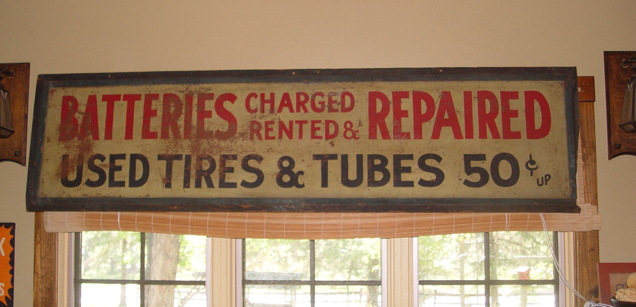 Rare Gas & Oil Service Station Tin Sign
                Batteries, Tires, Tubes