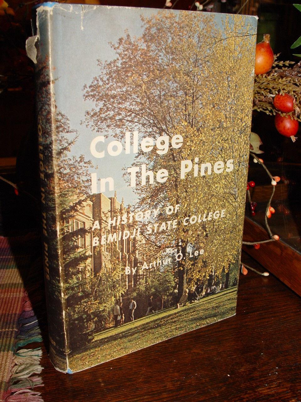 1970 College in
                        the Pines: A History of Bemidji State College
                        Signed Arthur Lee